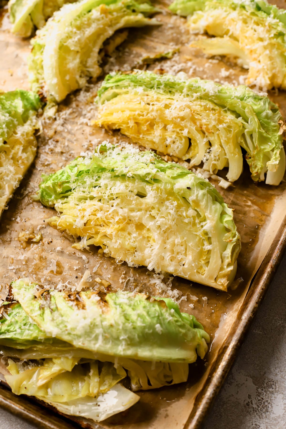 Roasted cabbage wedges with parmesan cheese. 