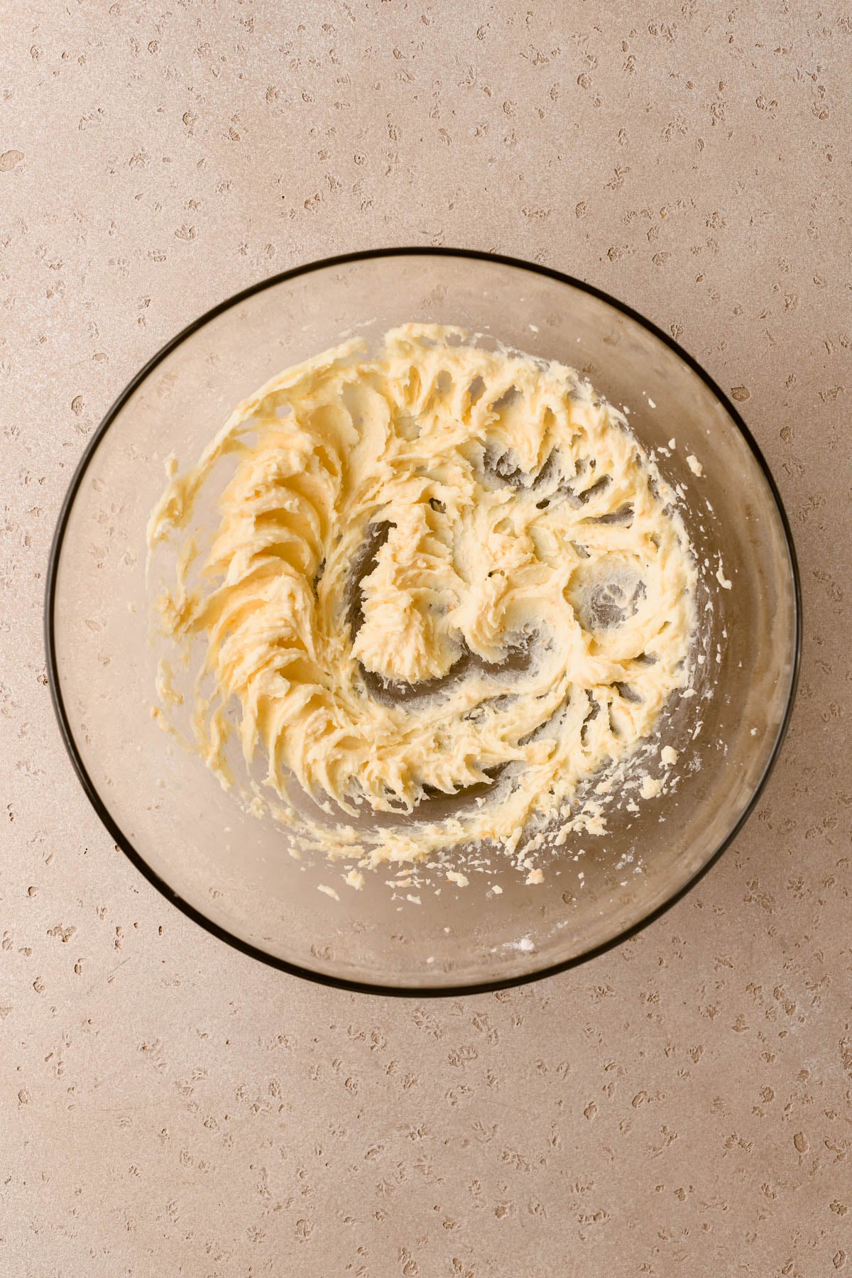 Creamed butter, sugar, ground cardamom, and orange zest. 