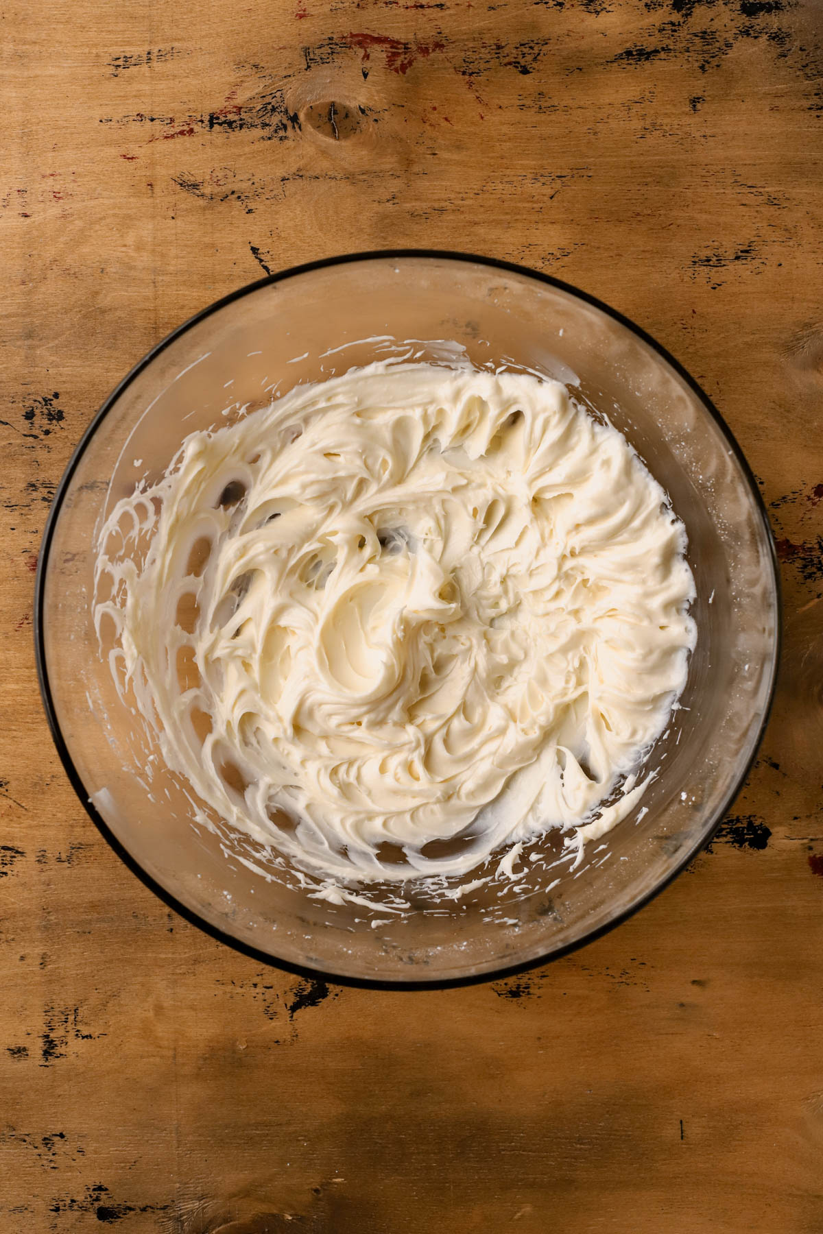 Whipped cream cheese with powdered sugar and vanilla extract. 