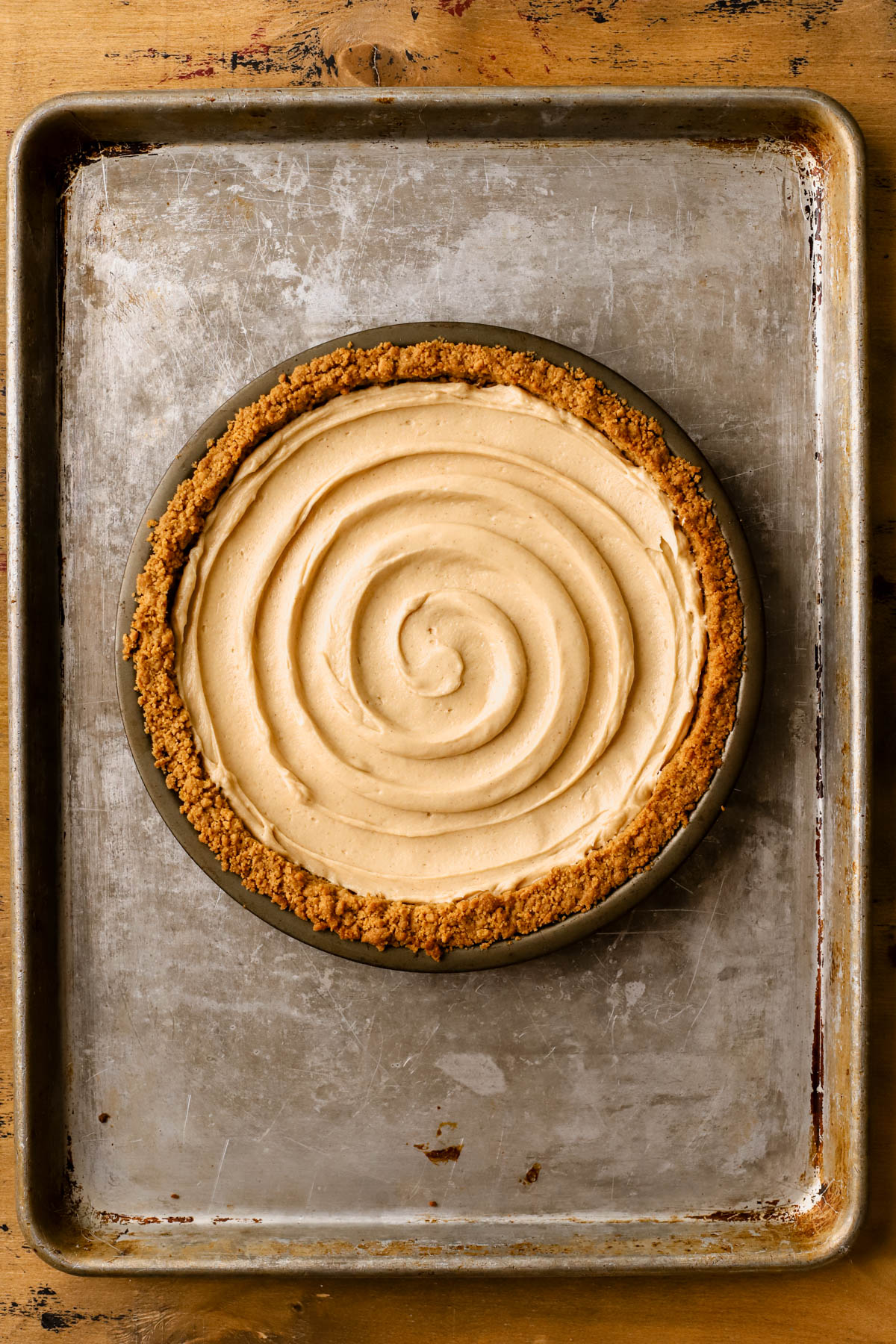 Peanut butter mousse spread into Nutter Butter crust. 