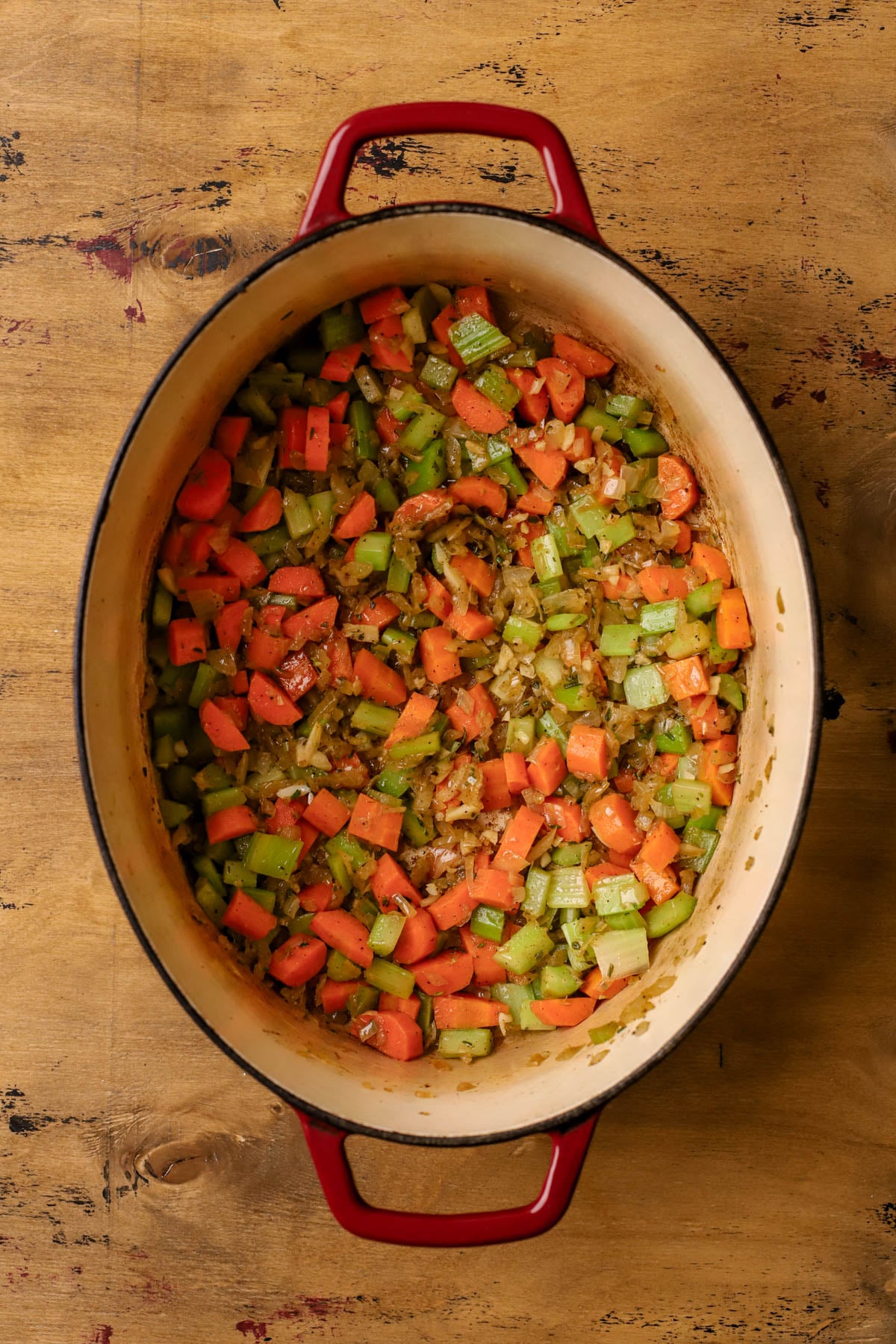 Saut&eacute;ed onions, garlic, celery, carrots, fresh thyme, and rosemary.