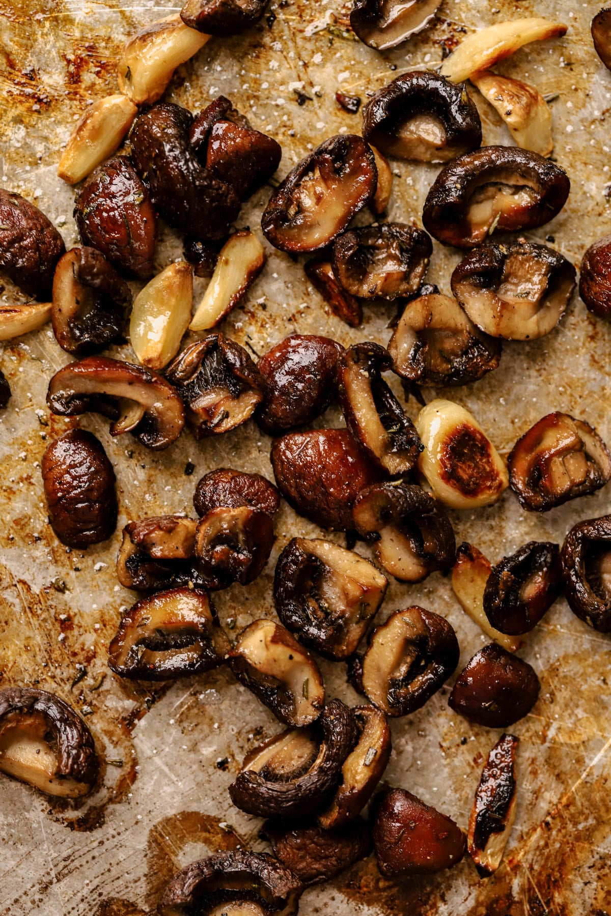 Roasted cremini mushrooms and garlic cloves. 