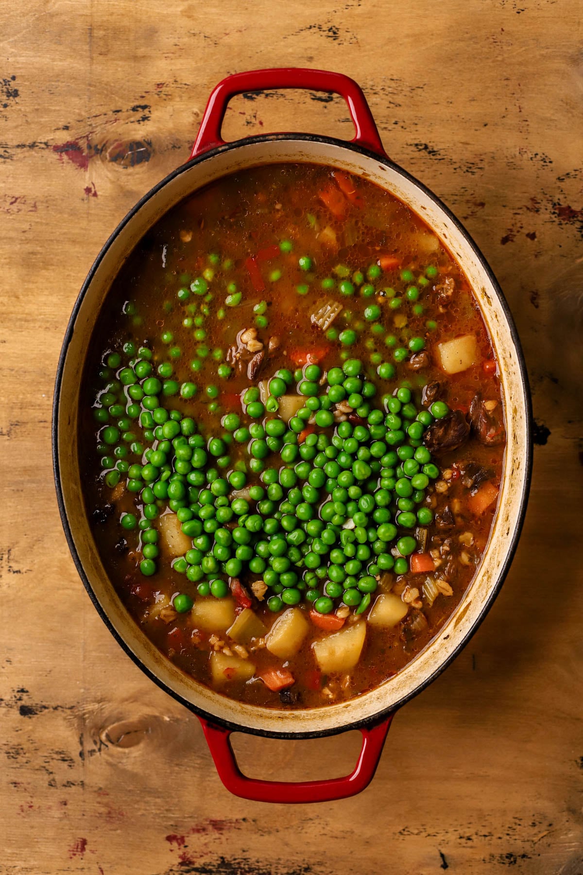 Green peas added to the soup.