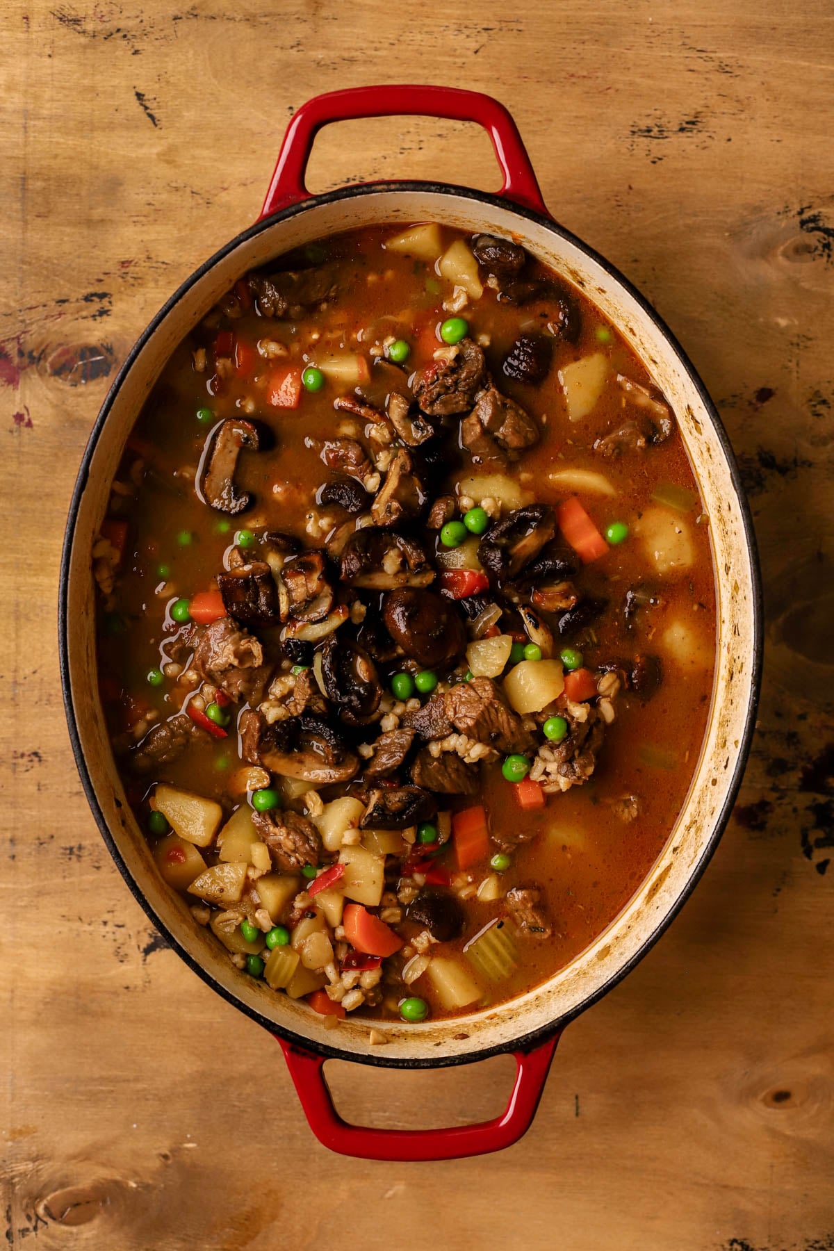 Roasted cremini's and garlic added to the beef barley mushroom soup.