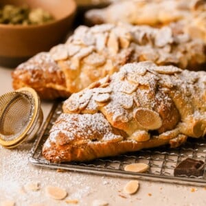 Chocolate almond croissant filled coated in cardamom simple syrup, and filled with orange frangipane, and